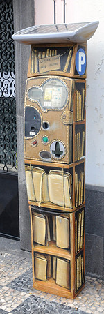 Parking meter painted up to look like a bookshelf