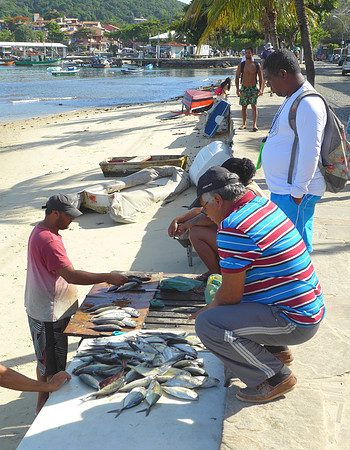 Selling fish on the beach