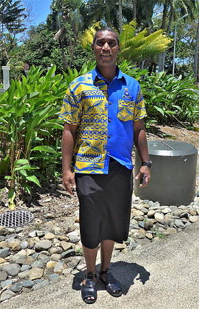 Suva resident wearing the traditional "sulu" bottoms and accompanying leather sandals