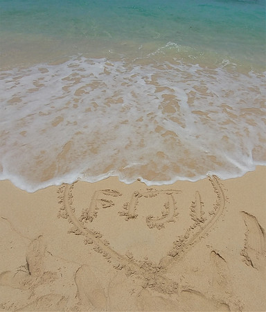 Golden sand and water all shades of blue and green