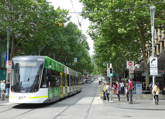 Tram along typical downtown street