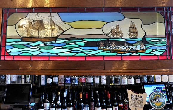 Part of the stained glass along the bar in The Whaler