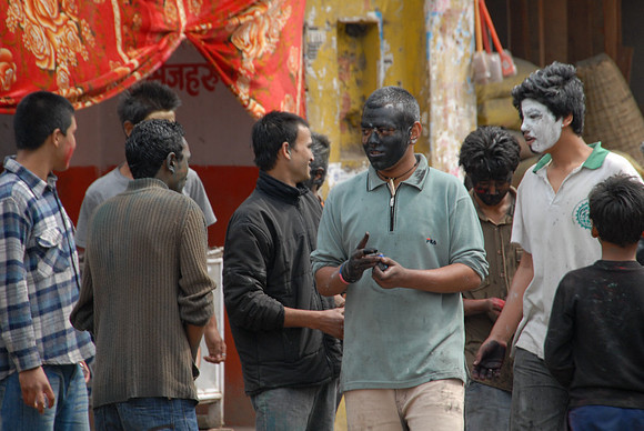 Locals with colour already on their faces