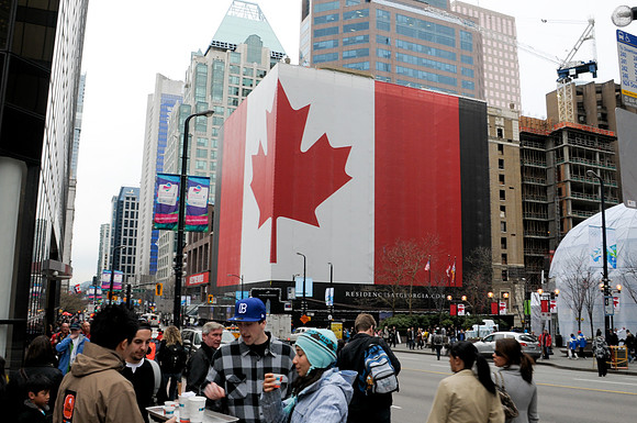 Former Hotel Georgia drapped in the Maple Leaf